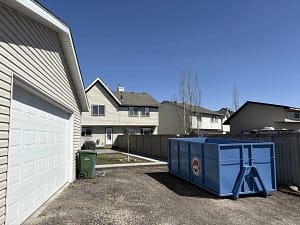 Rental bin in residential driveway